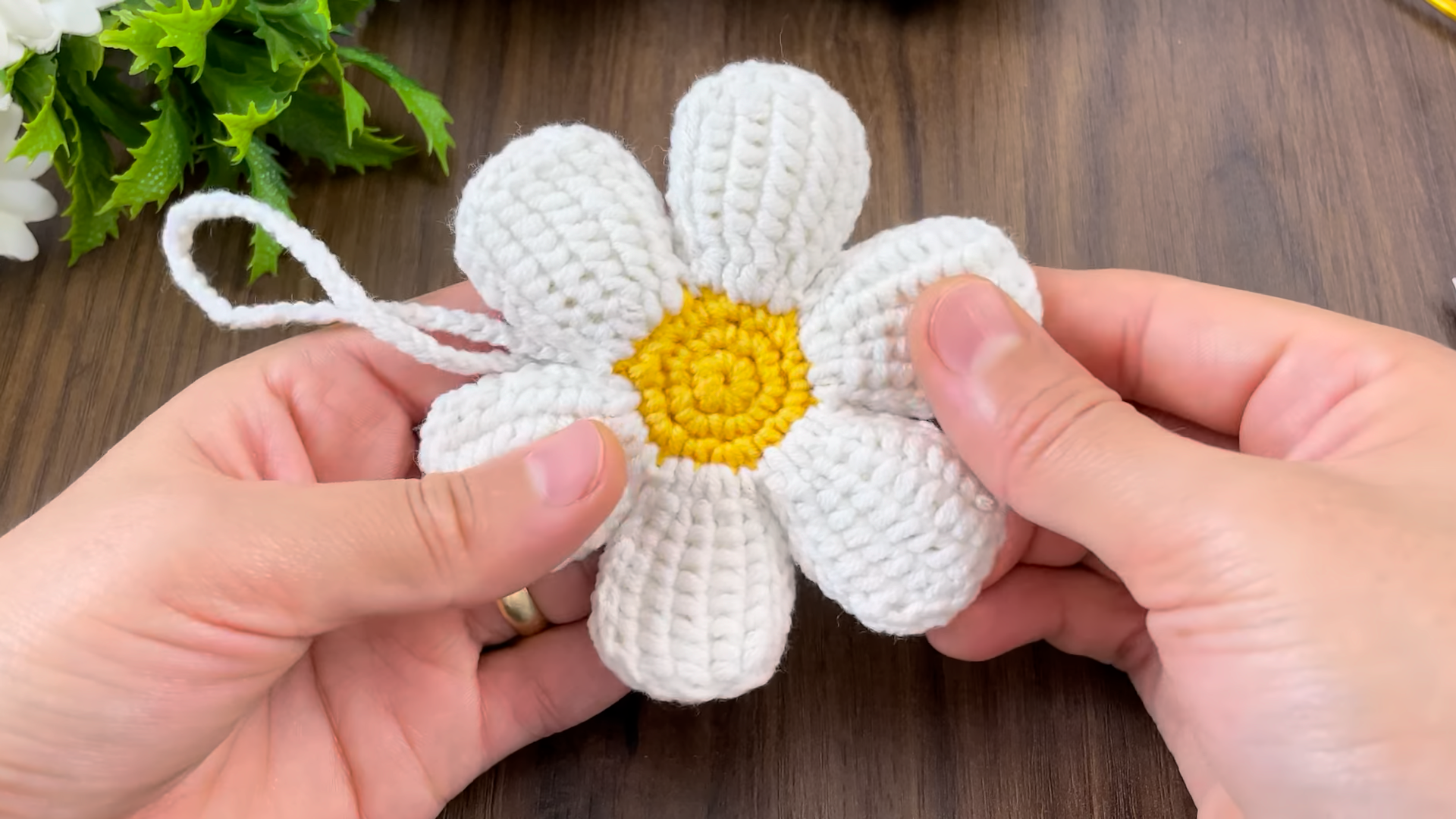 Crochet Daisy Keychain in white and yellow yarn
